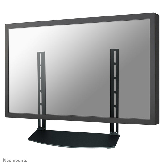 Uchwyt AV Neomounts, model NS-SHELF100, jest idealny do umieszczania sprzętu AV pod uchwytami do ekranów płaskich.